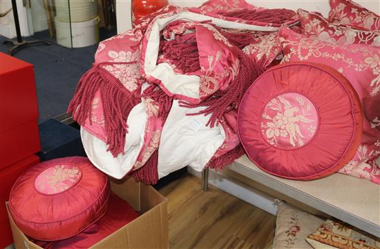 Two red ground cream silk brocade circular table covers, box covers and eight cushions etc